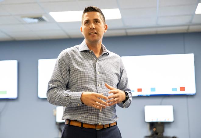 Brett Carnevale speaking at campus event